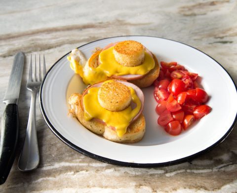 Cheesy Egg in a Basket With Maple-Glazed Bacon